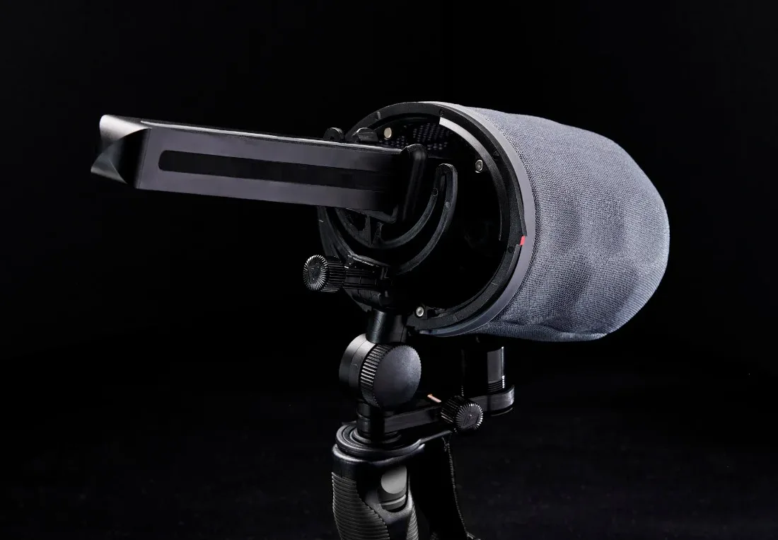 Rycote Nano-Shield basket open, showing the Konos mic seated on the clips with the windjammer fitted
